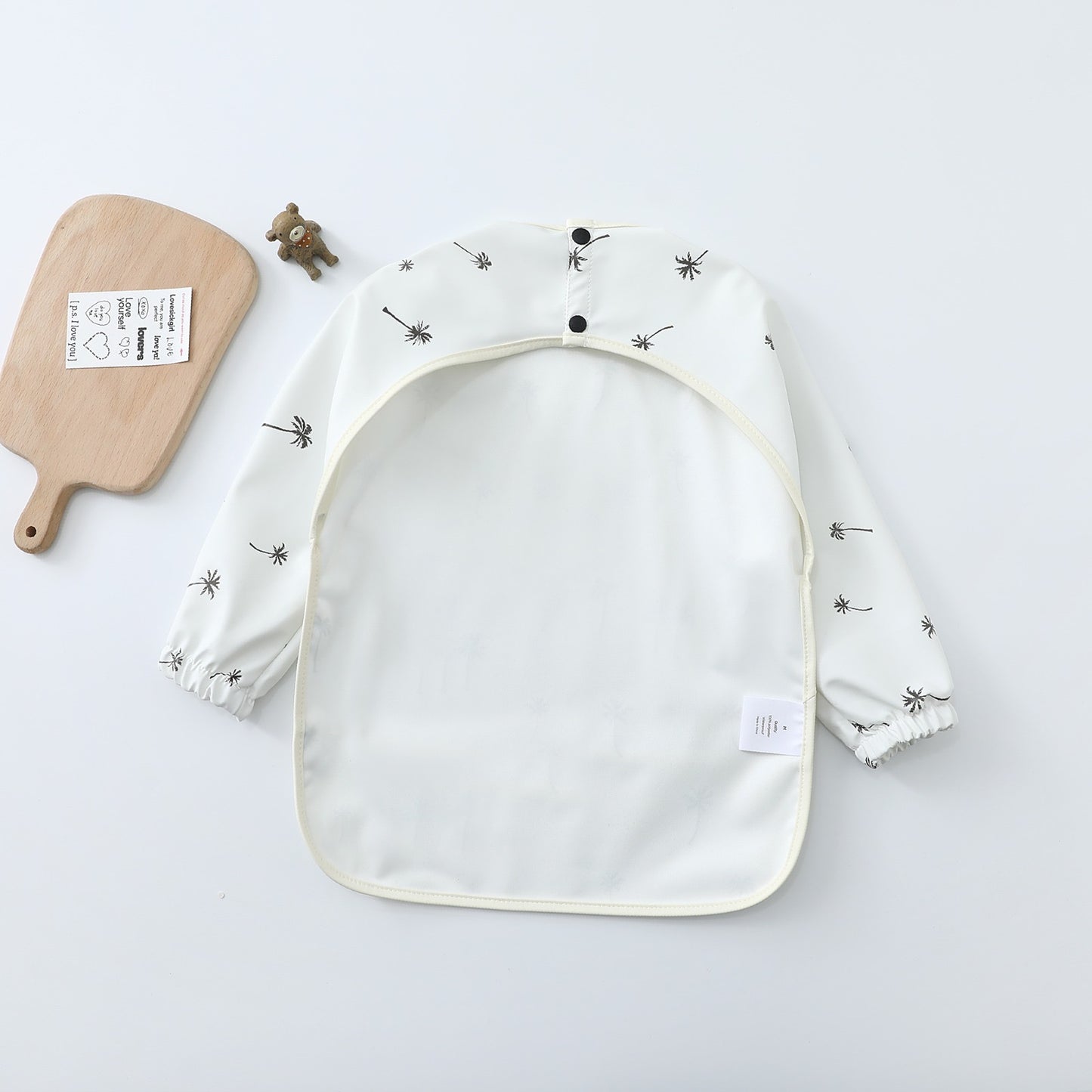 Waterproof Sleeved Cape Bib - The Palm Tree